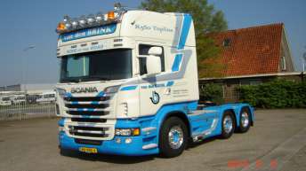 Scania R560 voor Van den Brink